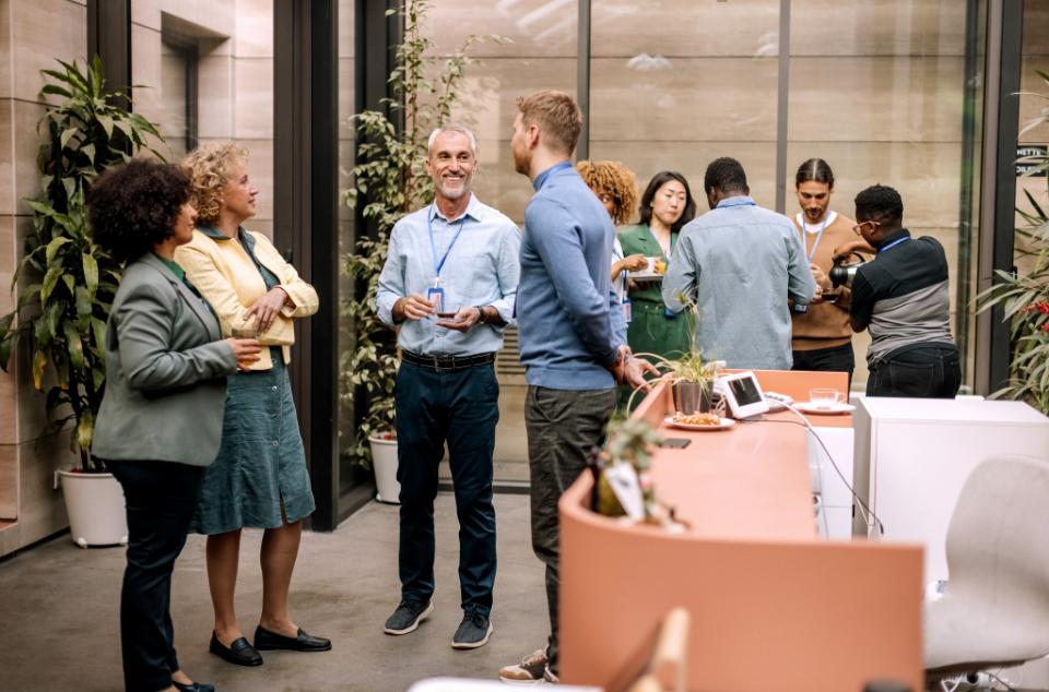 Professionals networking and smiling